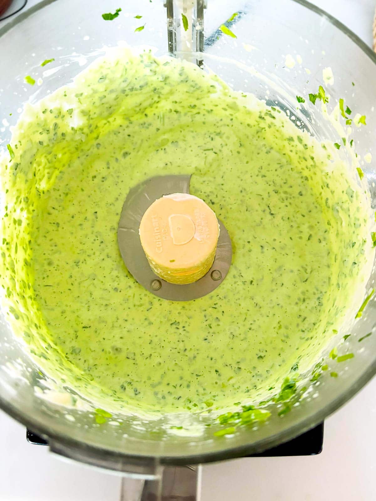 cilantro lime crema blended in a food processor. 